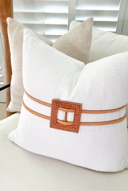white color sofa cover with cushions